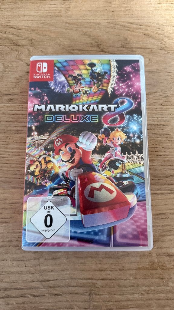 Mario Kart 8 Deluxe - Nintendo Switch, Spelcomputers en Games, Racen en Vliegen, Ophalen of Verzenden, Zo goed als nieuw, Eén computer