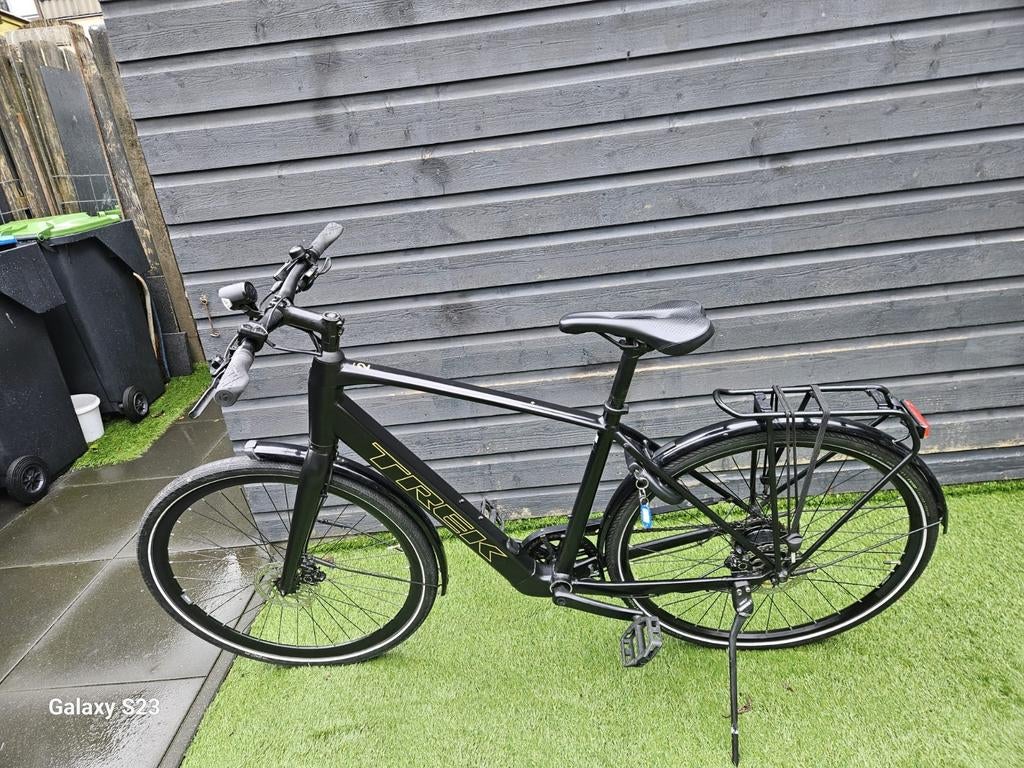 Zo goed als nieuw  Trek FX+2 elektrische herenfiets., Ophalen of Verzenden