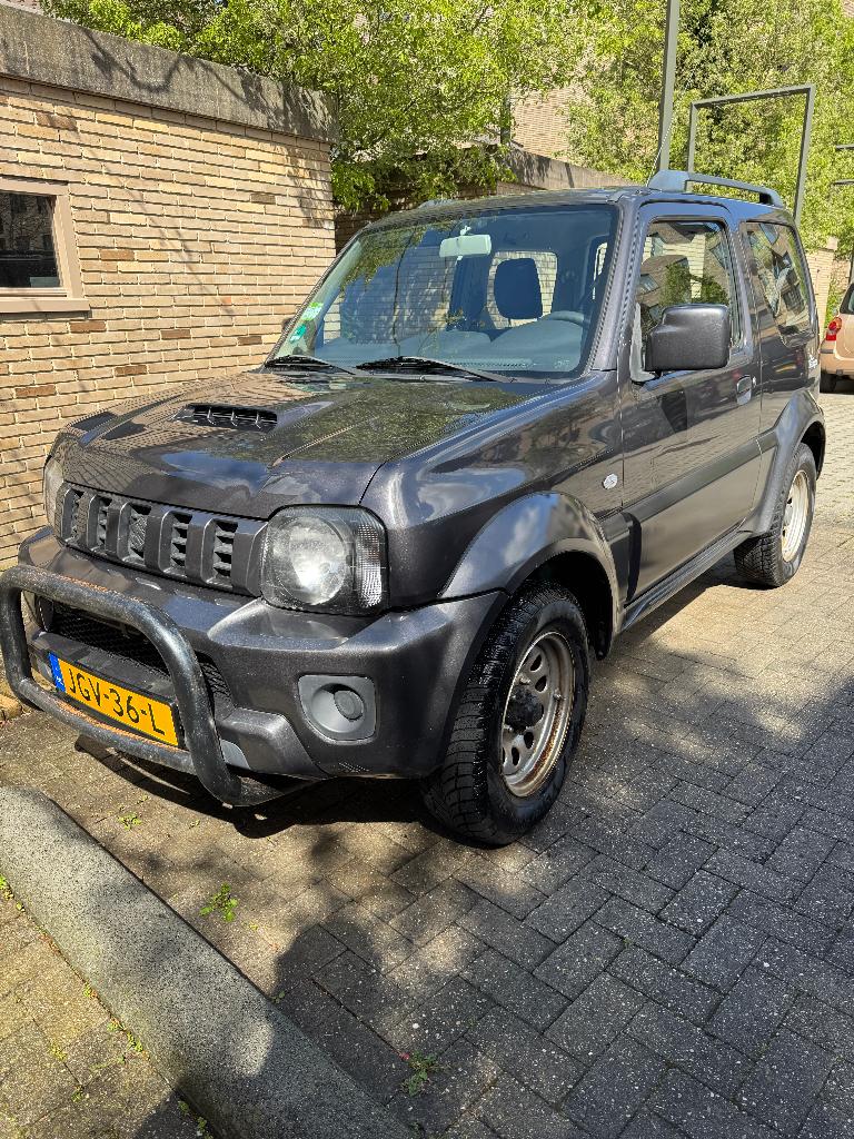 Suzuki Jimny 1.3 Ranger/Exclusive (2015) | 118.952 km, Stof, Euro 6, 4 stoelen, 14 km/l