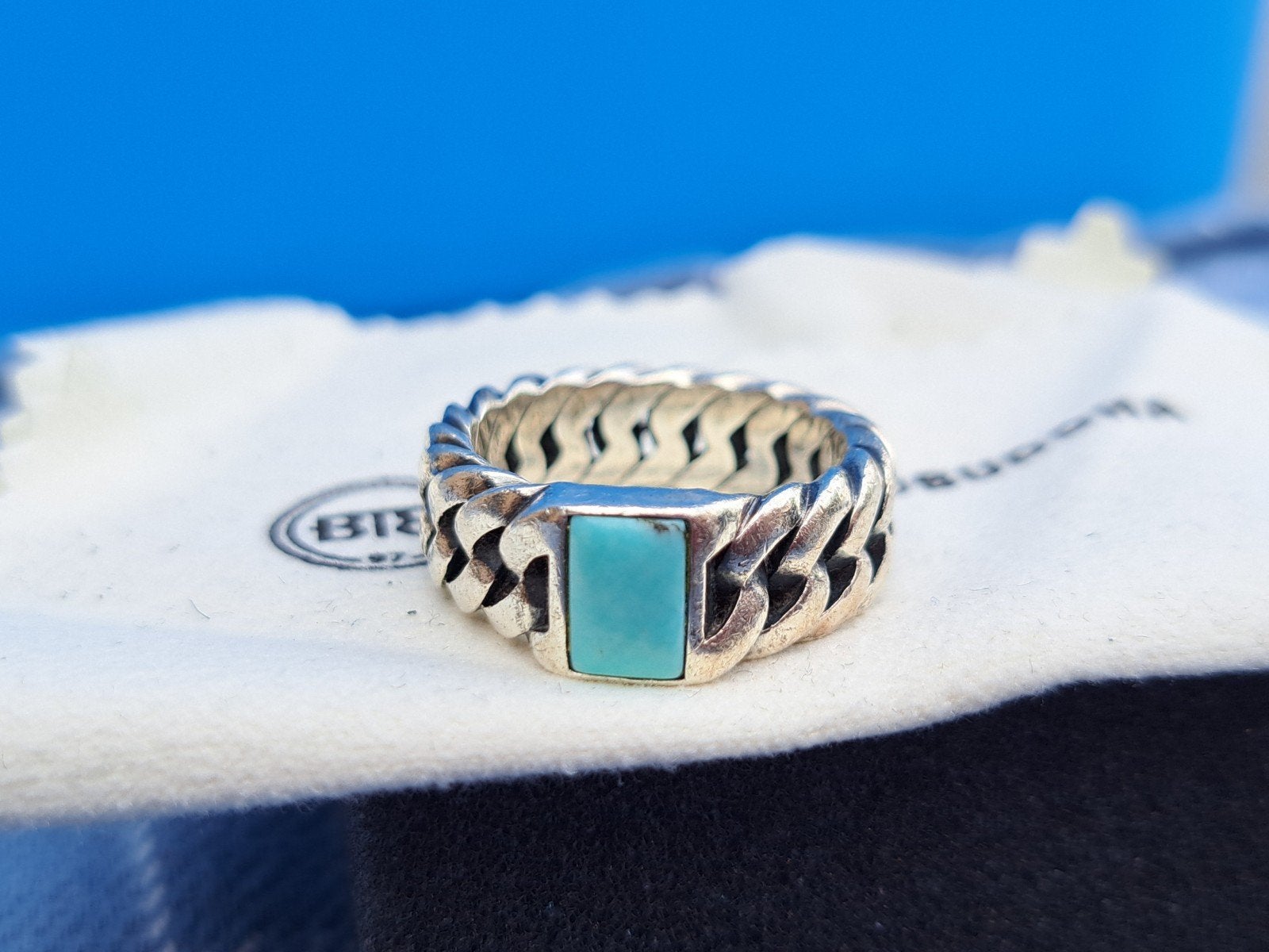 Buddha to Buddha ring met "aqua" blauwe steen, compleet, Verzenden, Zo goed als nieuw, Dame of Heer, Zilver
