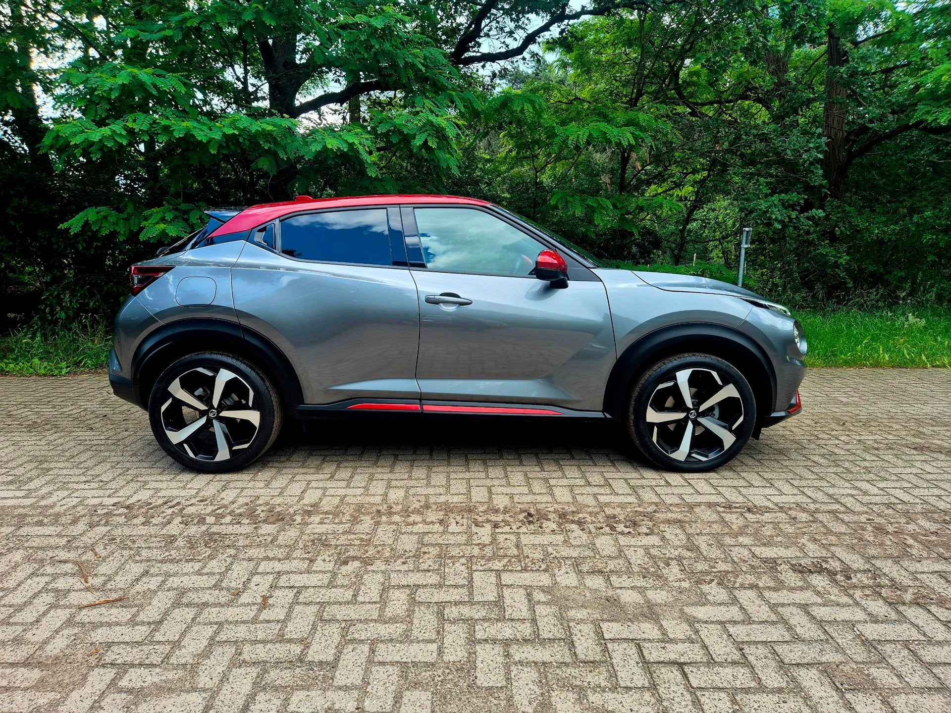 Nissan Juke 1.0 DIG-T Tekna / BOSE geluid / 19 inch, Gebruikt, Zwart, Bedrijf, 3 cilinders