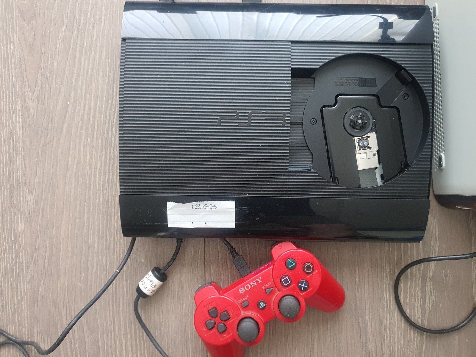tk PLAYSTATION 3 Super Slim met spelen, Ophalen