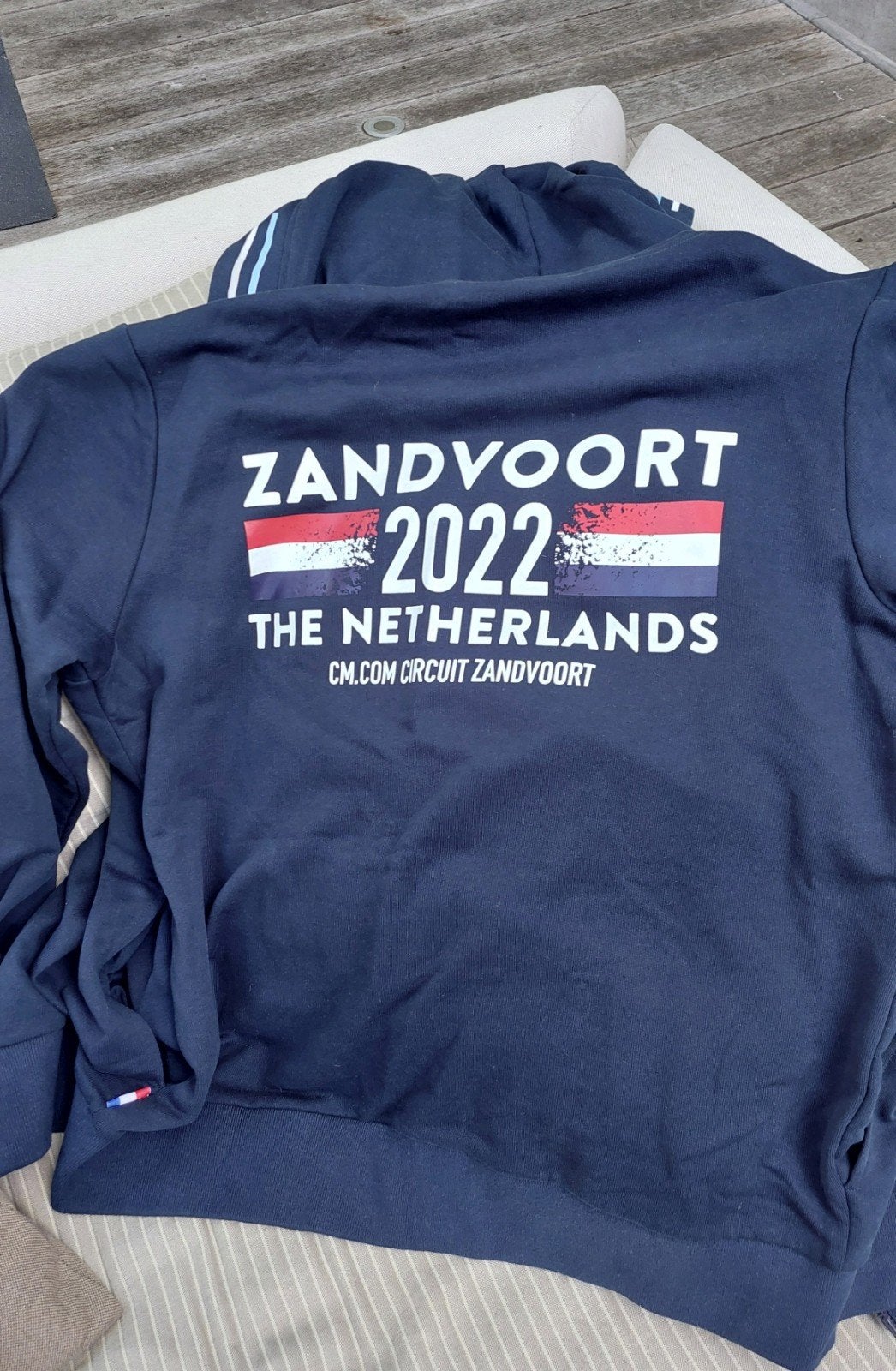 F1 Zandvoort vest met rits en capuchon Max Verstappen 2022, Ophalen of Verzenden, Zo goed als nieuw, Maat 56/58 (XL), Blauw