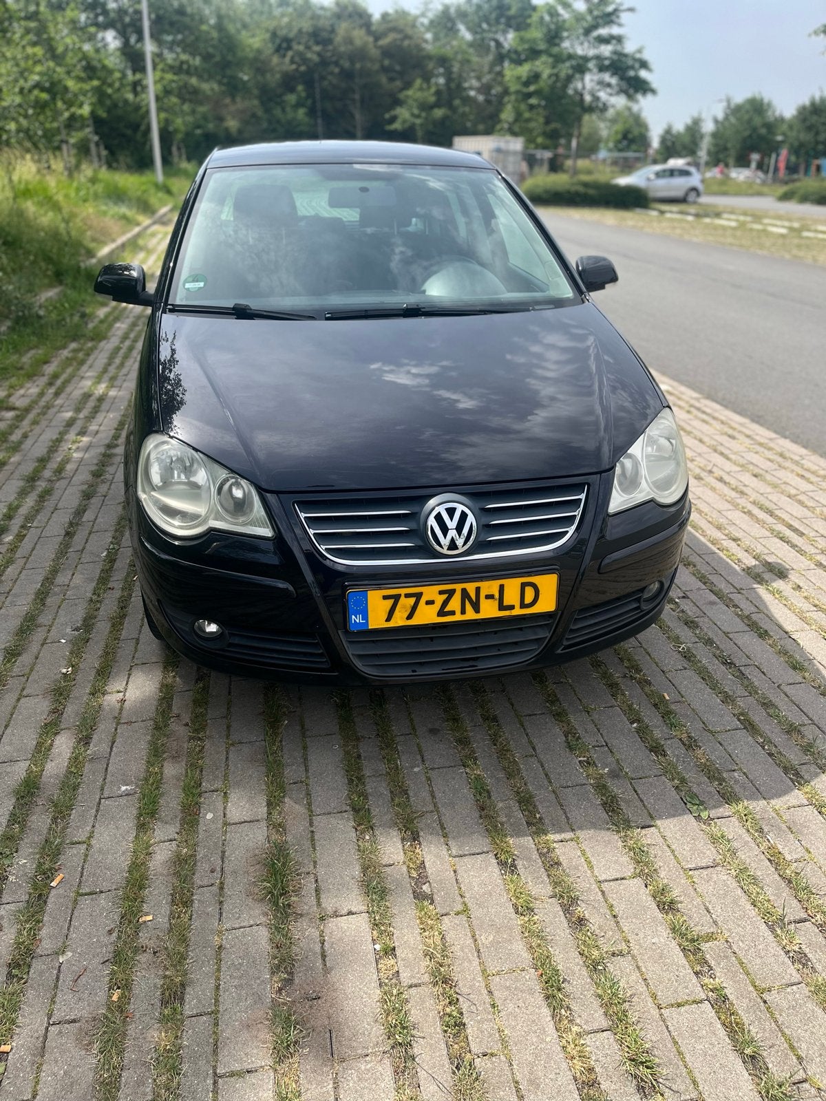 Volkswagen Polo 1.4 16V 59KW 2008 Zwart, Auto's, Volkswagen, Voorwielaandrijving, 40 €/maand, 4 cilinders, Zwart