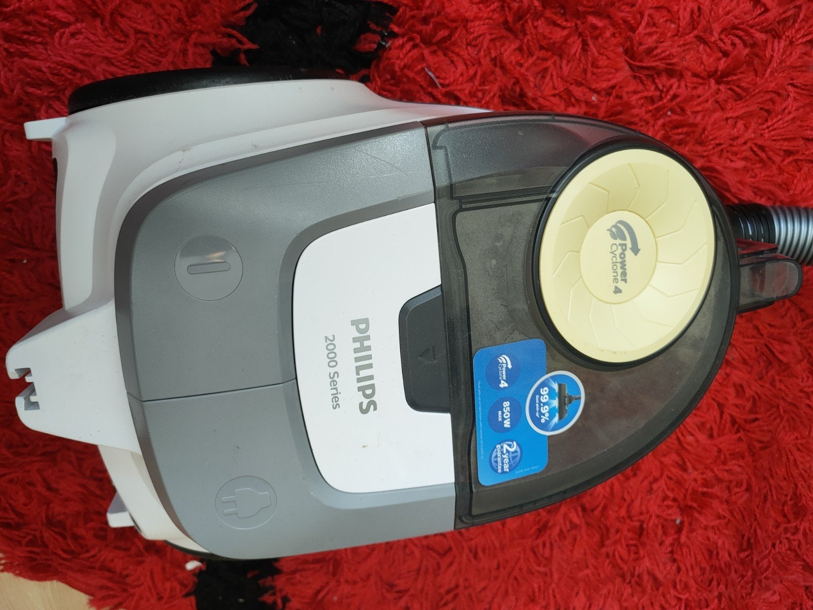 Philips stofzuiger zonder zak, Ophalen