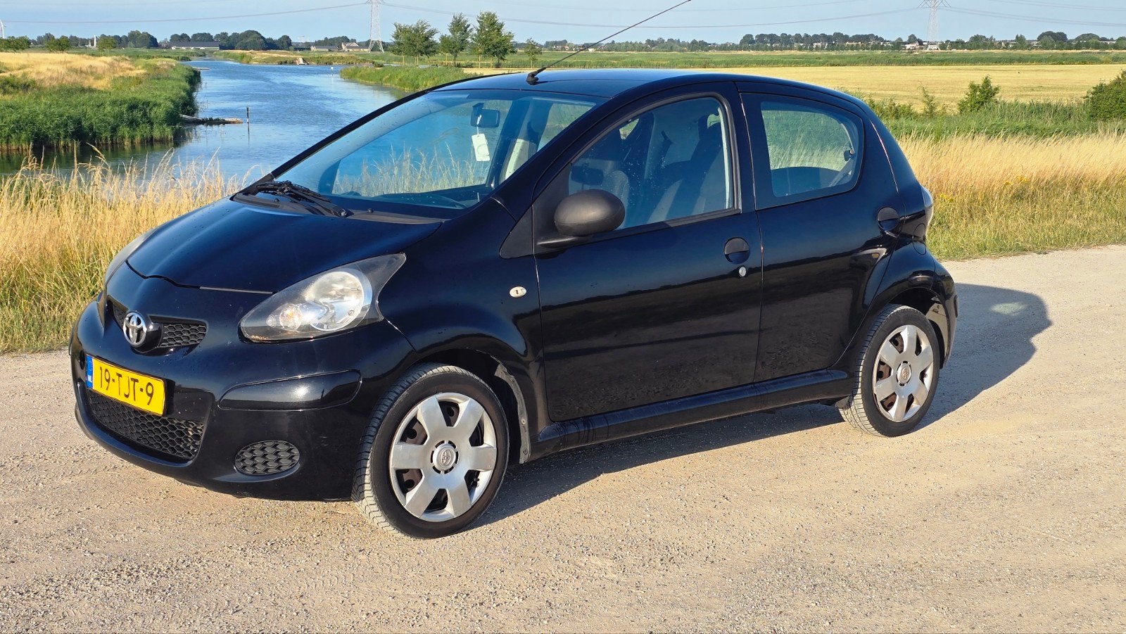 Toyota Aygo 1.0 12V Vvt-i 5DRS 2012 Zwart / NAP / APK / Airc, Auto's, Voorwielaandrijving, 4 stoelen, Origineel Nederlands, Handgeschakeld