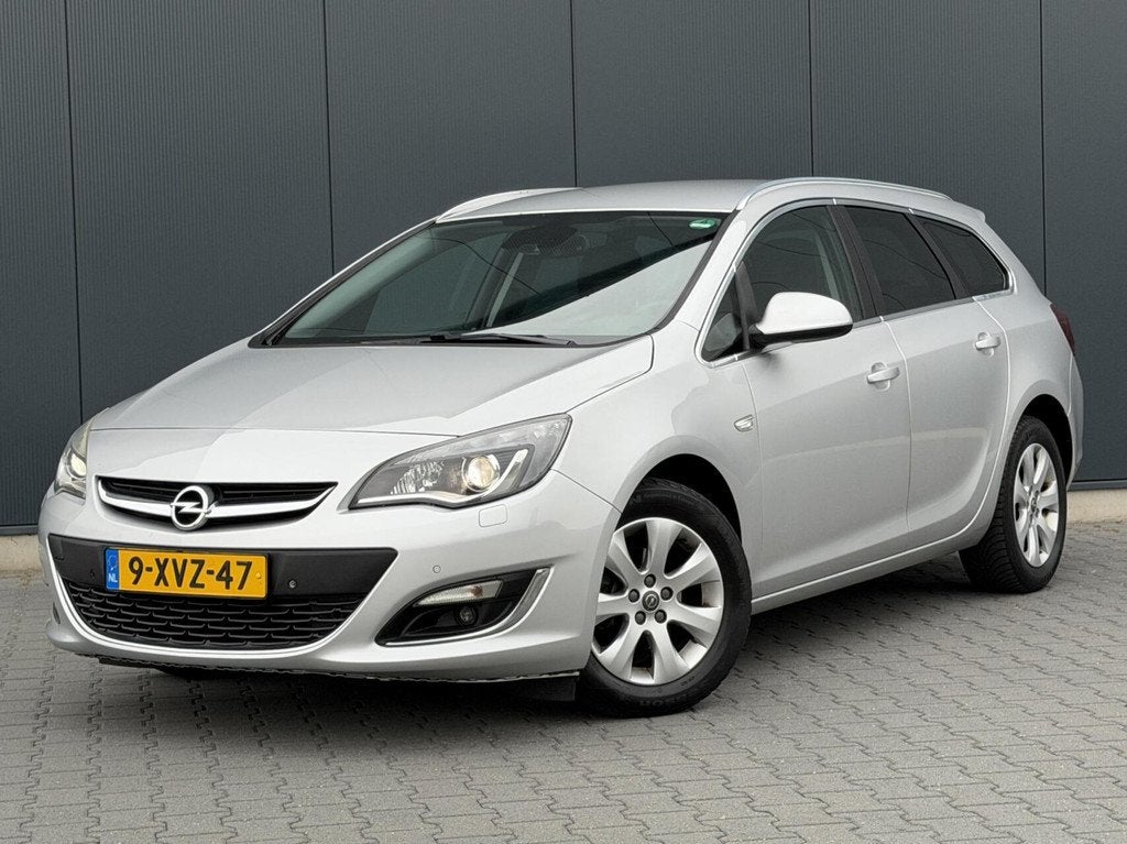 Opel Astra Sports Tourer 1.4 Turbo Sport Xenon - Leder - Tre, Euro 5, 15 km/l, Gebruikt, Zwart
