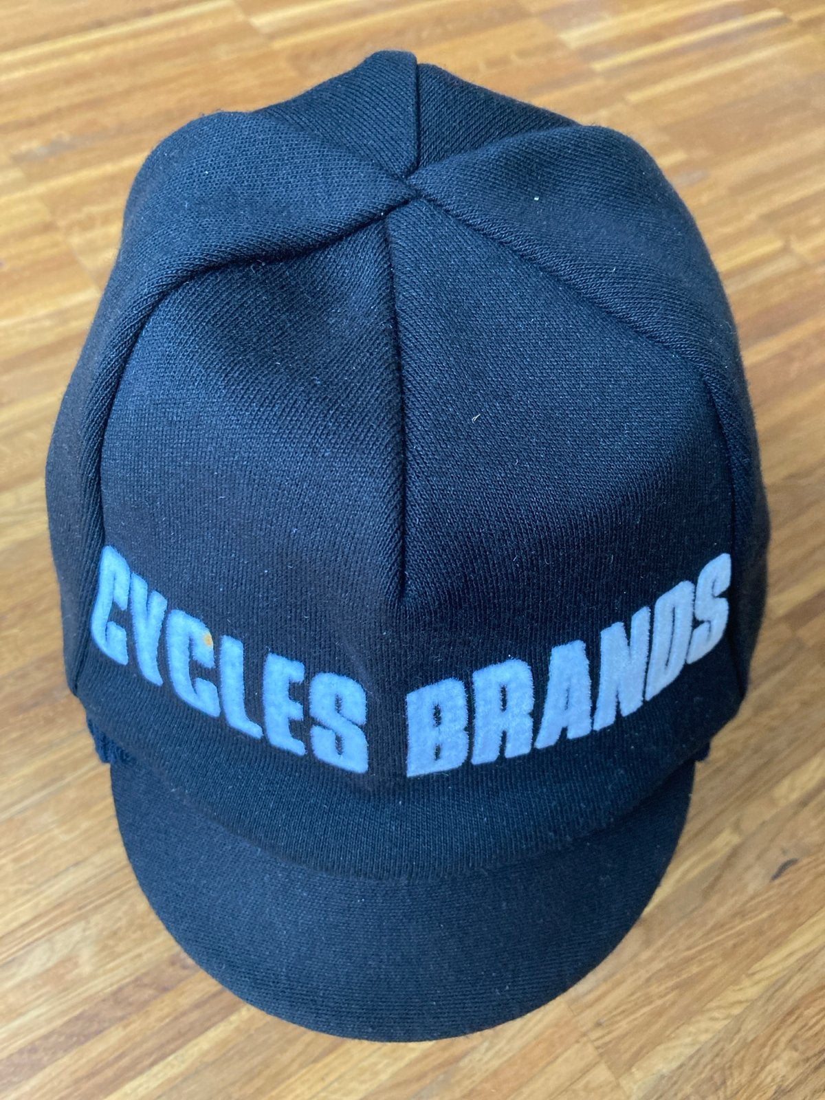 Vintage Cycles Brands Wielerpet - Zwart met regenboogstreep, Gebruikt, Overige maten, Ophalen of Verzenden, Brands Amsterdam