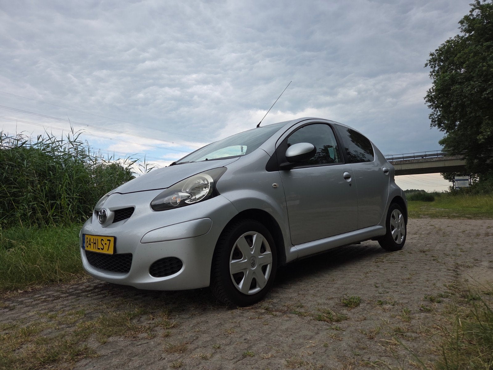 Toyota Aygo 1.0 12V Vvt-i 5DRS 2009 Grijs, Auto's, Voorwielaandrijving, 4 stoelen, 68 pk, Origineel Nederlands