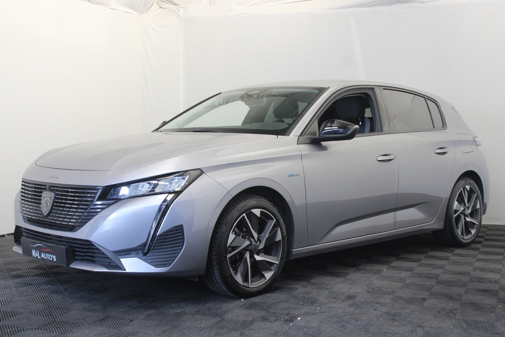 Peugeot 308 1.6 Plug-in Hybrid 180 Allure (bj 2023), Auto's, Parkeersensor, Gebruikt, 4 cilinders, Leder en Stof