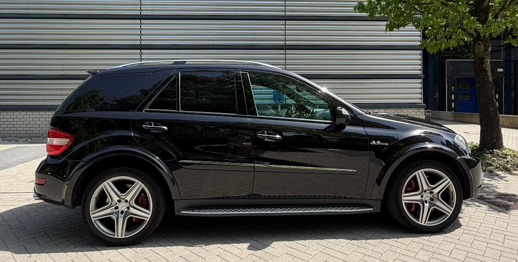 Mercedes Benz ML 63 AMG 10th Anniversary Edi. Volledig OH, Auto's, Mercedes-Benz, Automaat, Zwart, Leder, Vierwielaandrijving