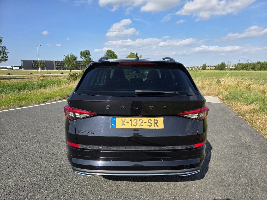 Skoda Kodiaq 2.0 TSI 4x4 Sportline Pano | Camera | 190PK, Auto's, Automaat, Dealer onderhouden, Zwart, 1984 cc
