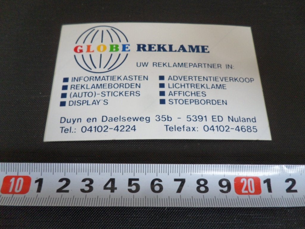 sticker nuland globe reklame duyn en daelseweg 35b, Ophalen, Zo goed als nieuw