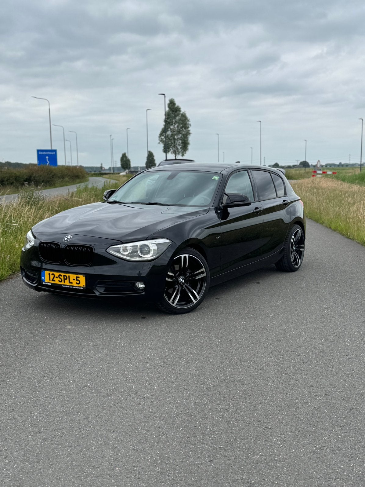 BMW 1-Serie 116I 100KW 5DR 2011 Zwart, Auto's, BMW, 1-Serie, Euro 5, Zwart, 4 cilinders