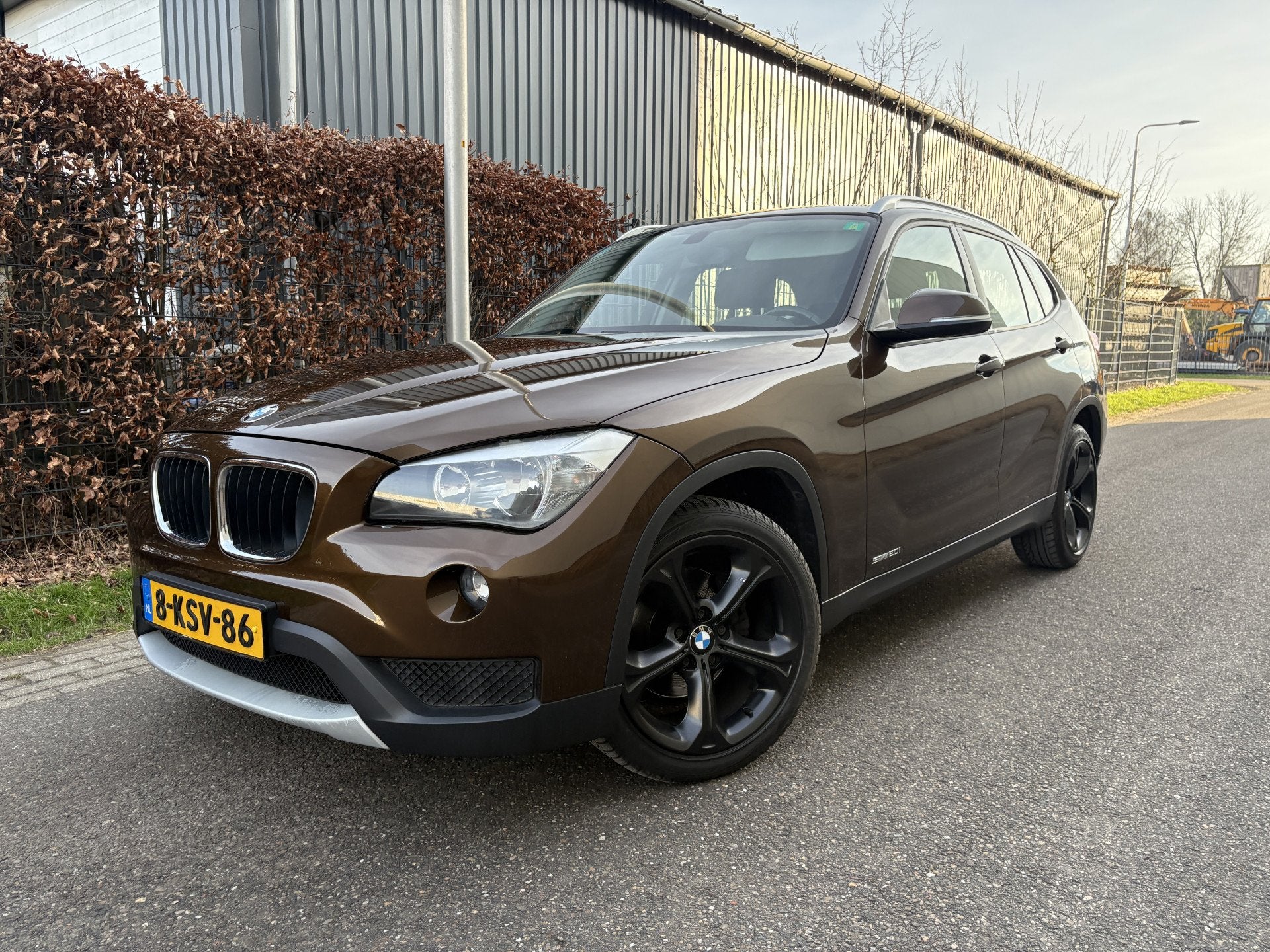 BMW X1 sDrive20i Executive / AUTOMAAT / NAVI / CRUISE, Euro 6, 4 cilinders, Bruin, Origineel Nederlands