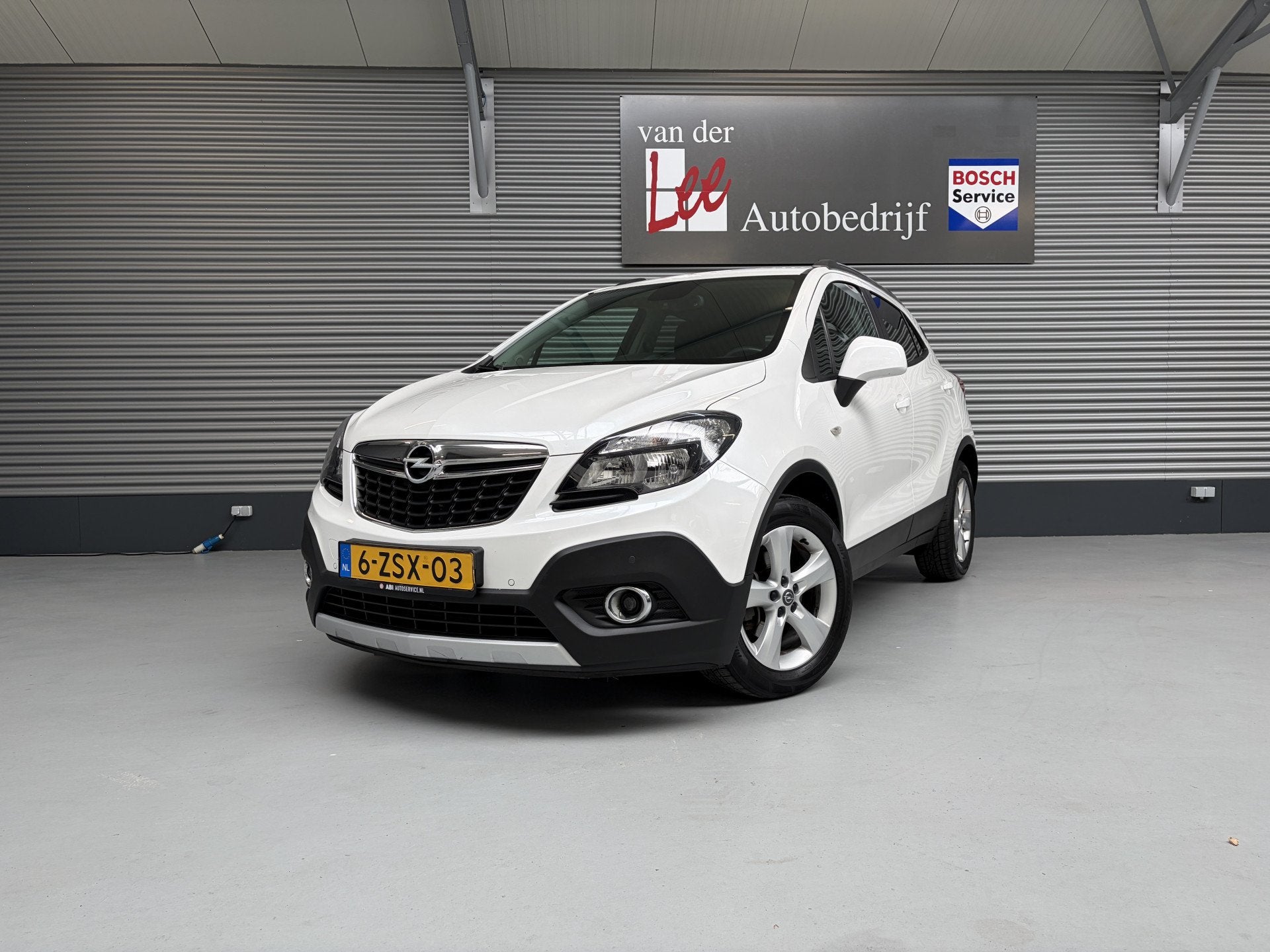 Opel Mokka 1.4 T 140PK CLIMA/PDC/NAVI/TREKHAAK/PEARL LAK/ENZ, Auto's, Euro 5, Stof, Gebruikt, Zwart