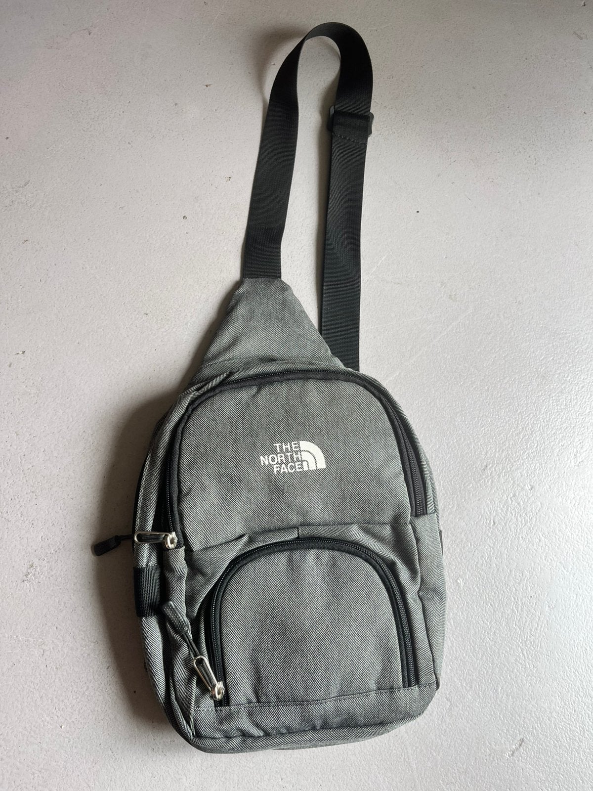 The North Face cross body sling, Ophalen of Verzenden, Zo goed als nieuw, Grijs