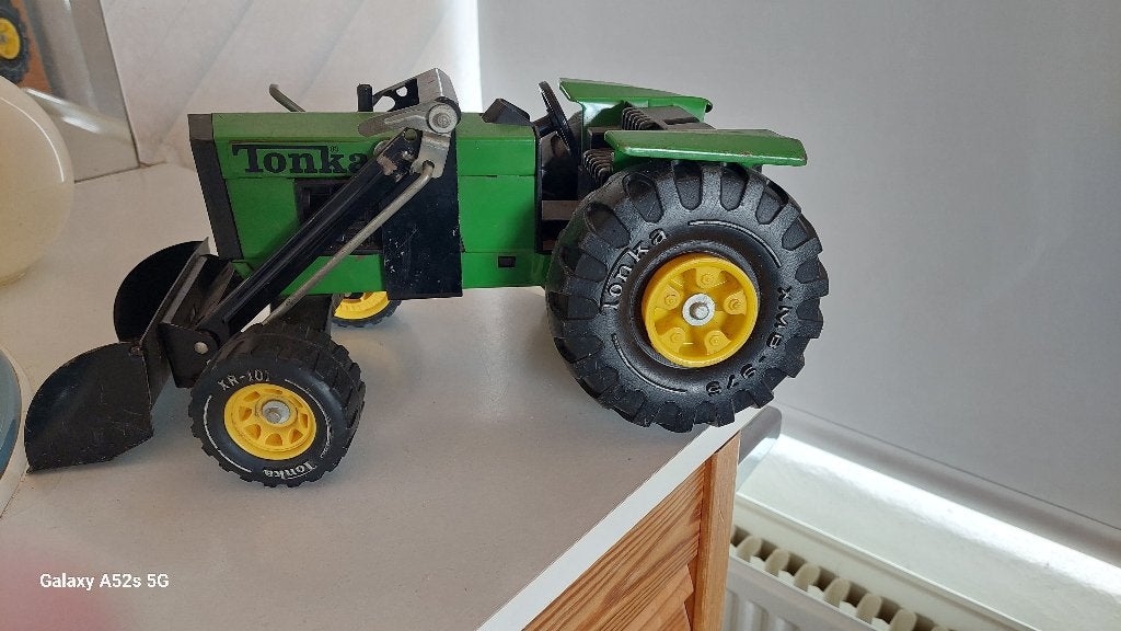 TONKA tractor en hijskraan, Ophalen