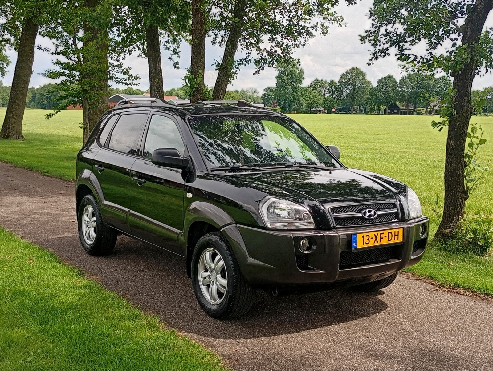 Hyundai Tucson 2.0 I 2WD 2007 Airco 1 eigenaar. lage KM NAP, Stof, Zwart, 4 cilinders, Zwart