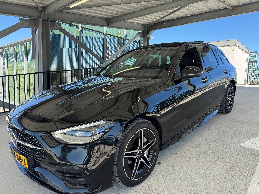 Mercedes-Benz C300e AMG | Panorama | HeadUp | CoPilot | VOL!, Automaat, Achterwielaandrijving, 1800 kg, Zwart