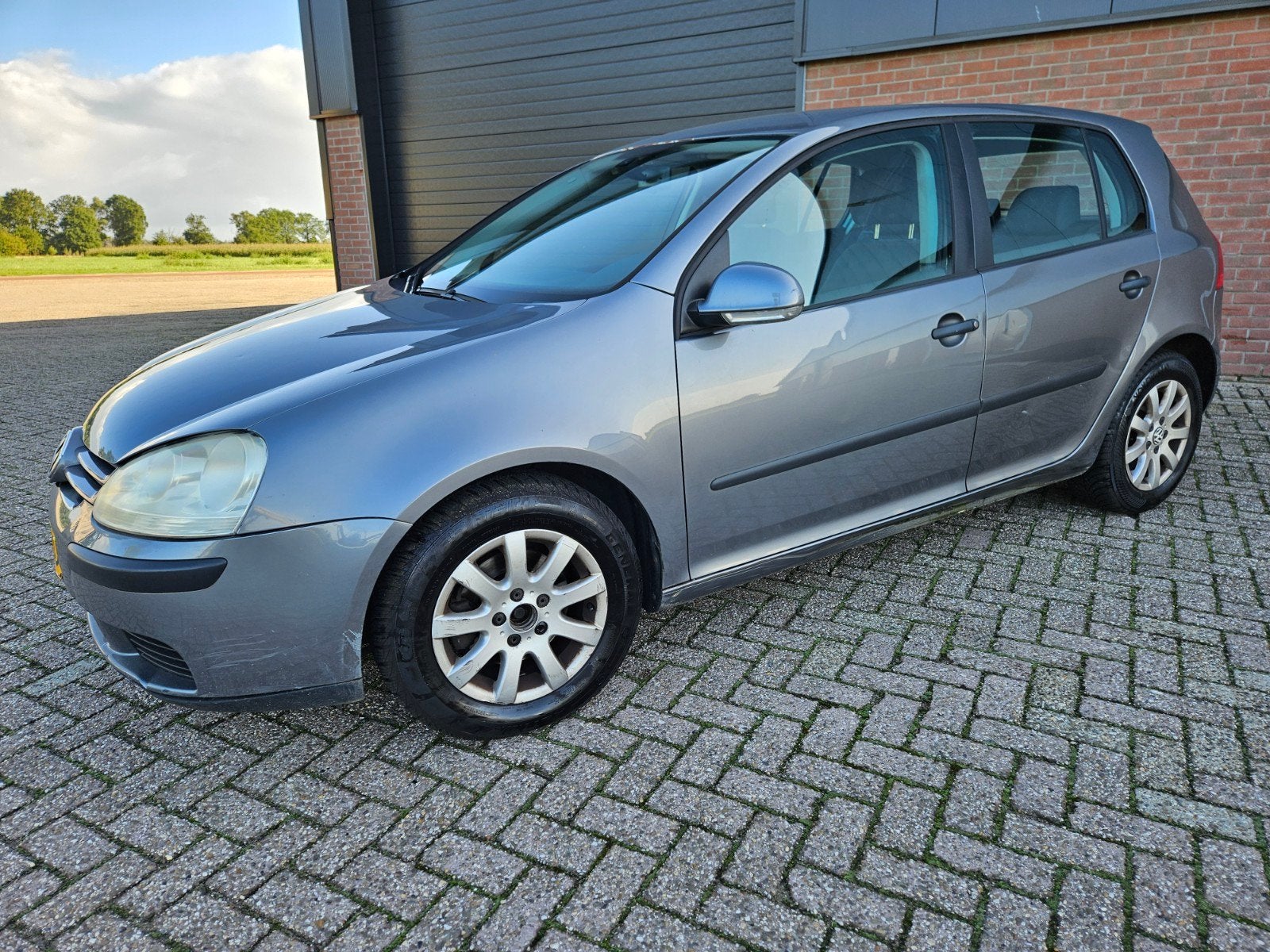 Volkswagen Golf 1.6 16V FSI 85KW 5D AUT 2005 Grijs, Stof, 4 cilinders, 1200 kg, Parkeersensor