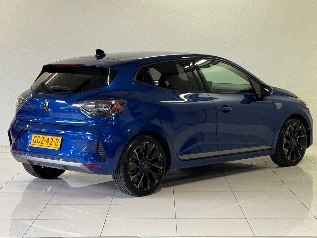 Renault Clio 1.6 E-Tech Full Hybrid 145 Esprit Alpine | 360, Auto's, Gebruikt, Met garantie (alle), Blauw, Leder en Stof