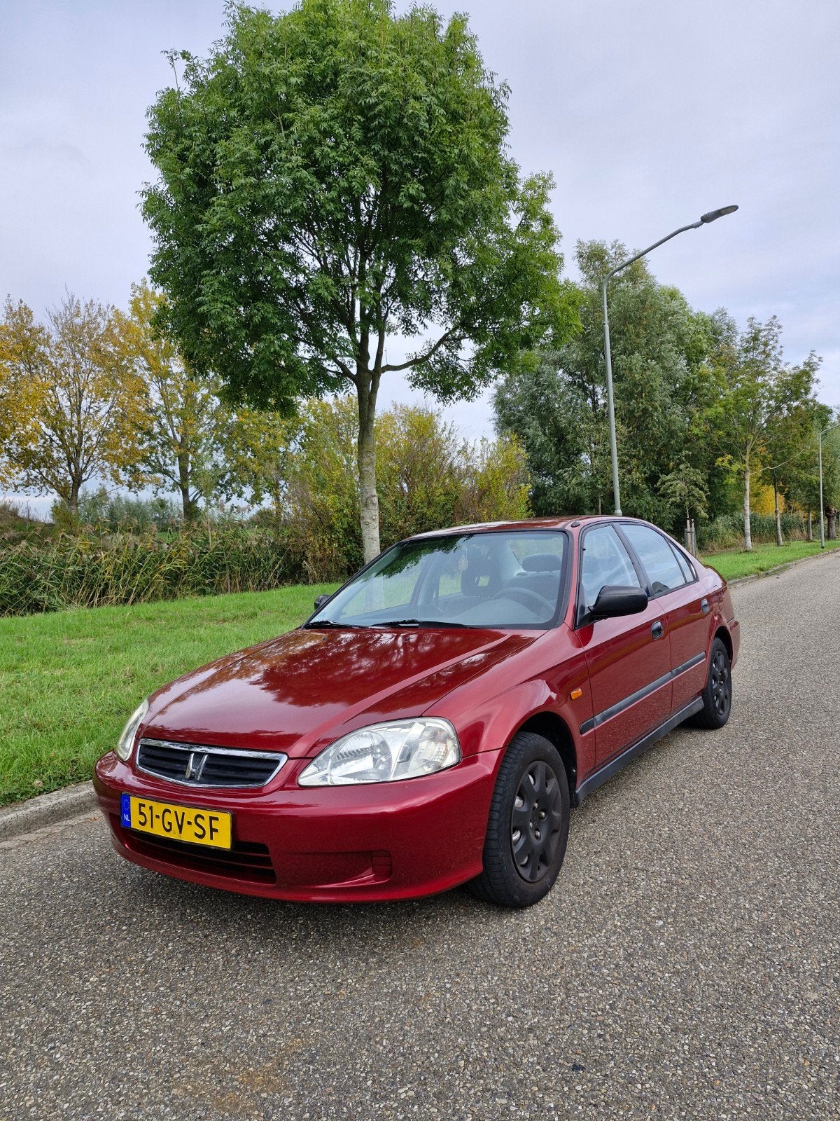 Honda Civic 1.4 I S SDN AUT 2001 Rood, Auto's, 40 €/maand, 4 cilinders, 1396 cc, 990 kg