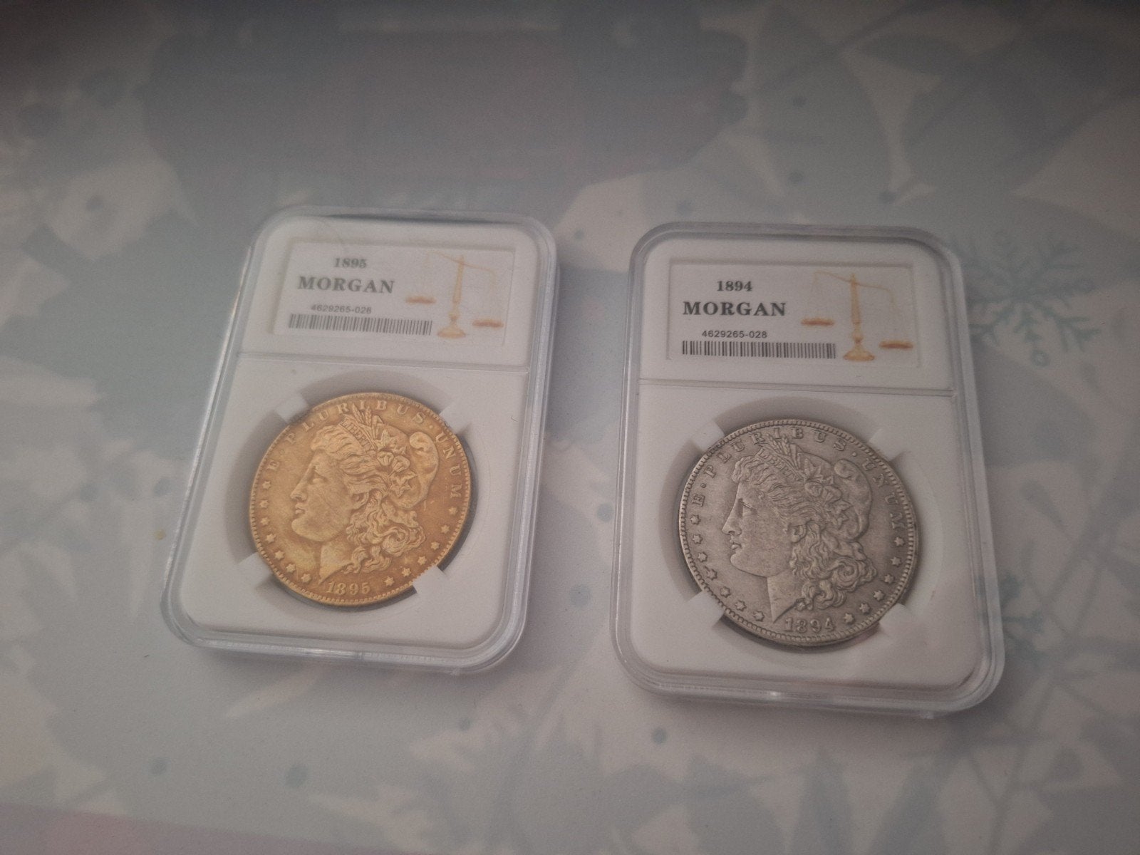 2 Morgan Munten. 1894 - 1895. Replica. Nieuw., Ophalen of Verzenden, Buitenland, Munten