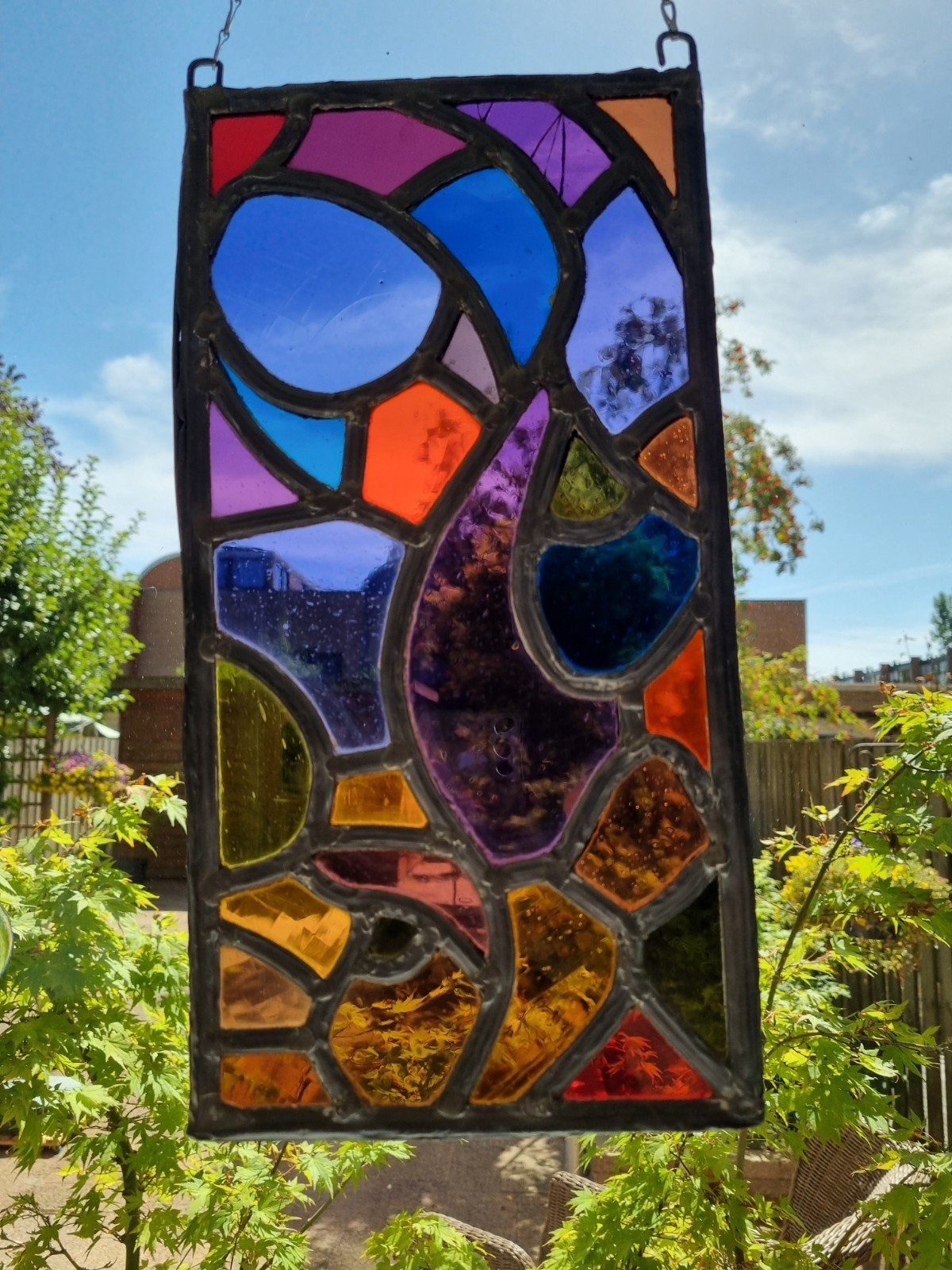 Glas in lood raamhanger, Ophalen