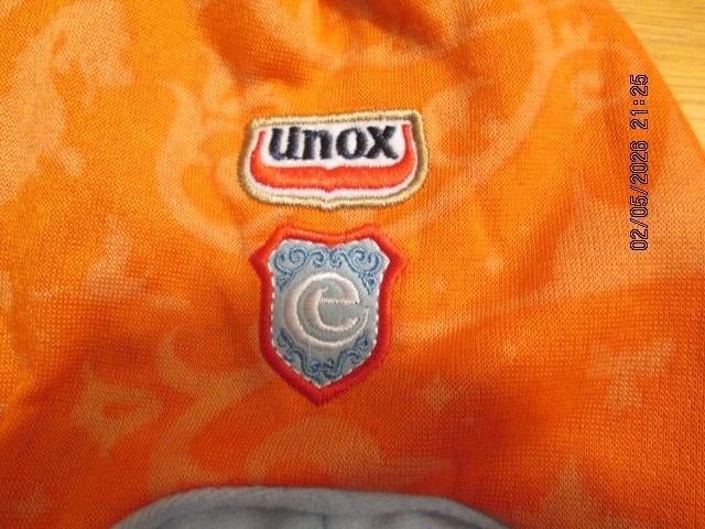 Oranje UNOX muts en uitgeven in combinatie met De Efteling, Ophalen of Verzenden, Zo goed als nieuw, Gebruiksvoorwerp