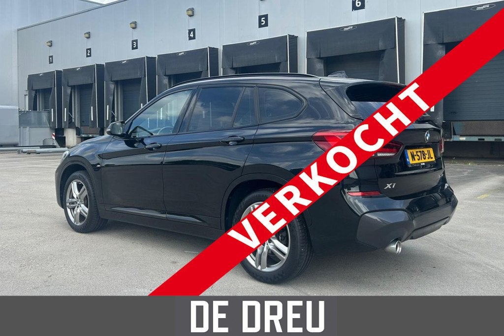 BMW X1 SDrive18i High Executive | M-SPORT | SHADOWLINE | EL, Auto's, 136 pk, Gebruikt, Leder en Stof, Zwart