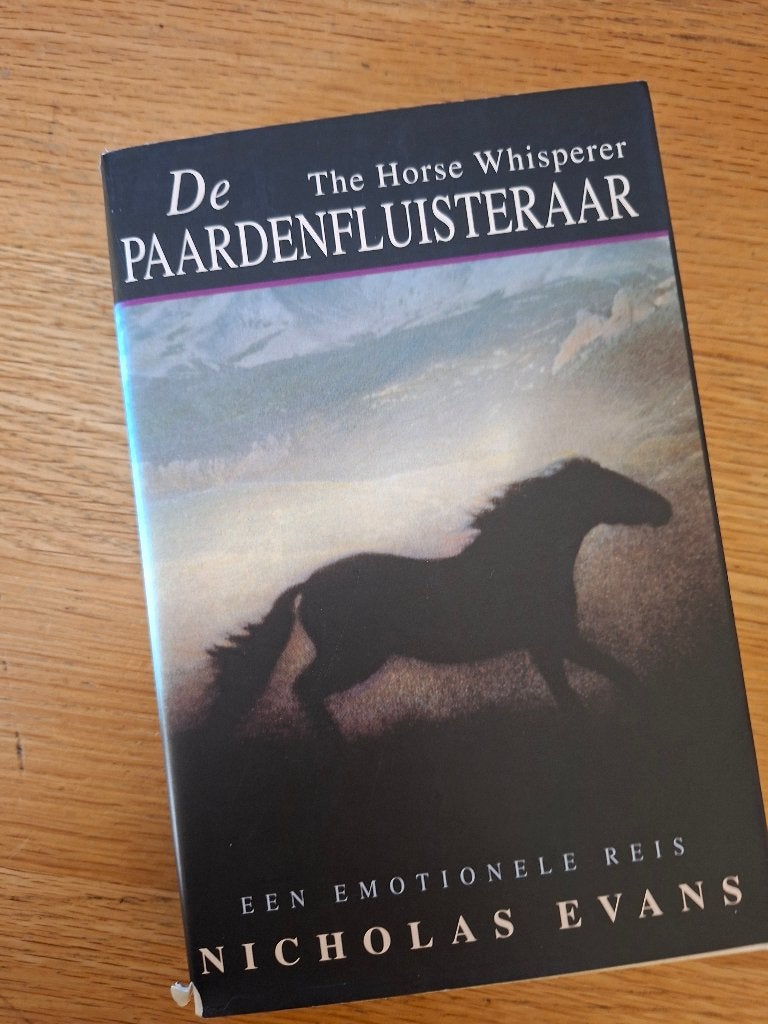 Nicholas Evans, De paardenfluisteraar, Ophalen of Verzenden, Zo goed als nieuw