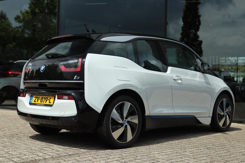 BMW I3 BASIS 120AH 42KWH SOH 94% | NAVI | ORIG NL | PDC | LE, Auto's, BMW, Automaat, 4 stoelen, 258 min, Wit