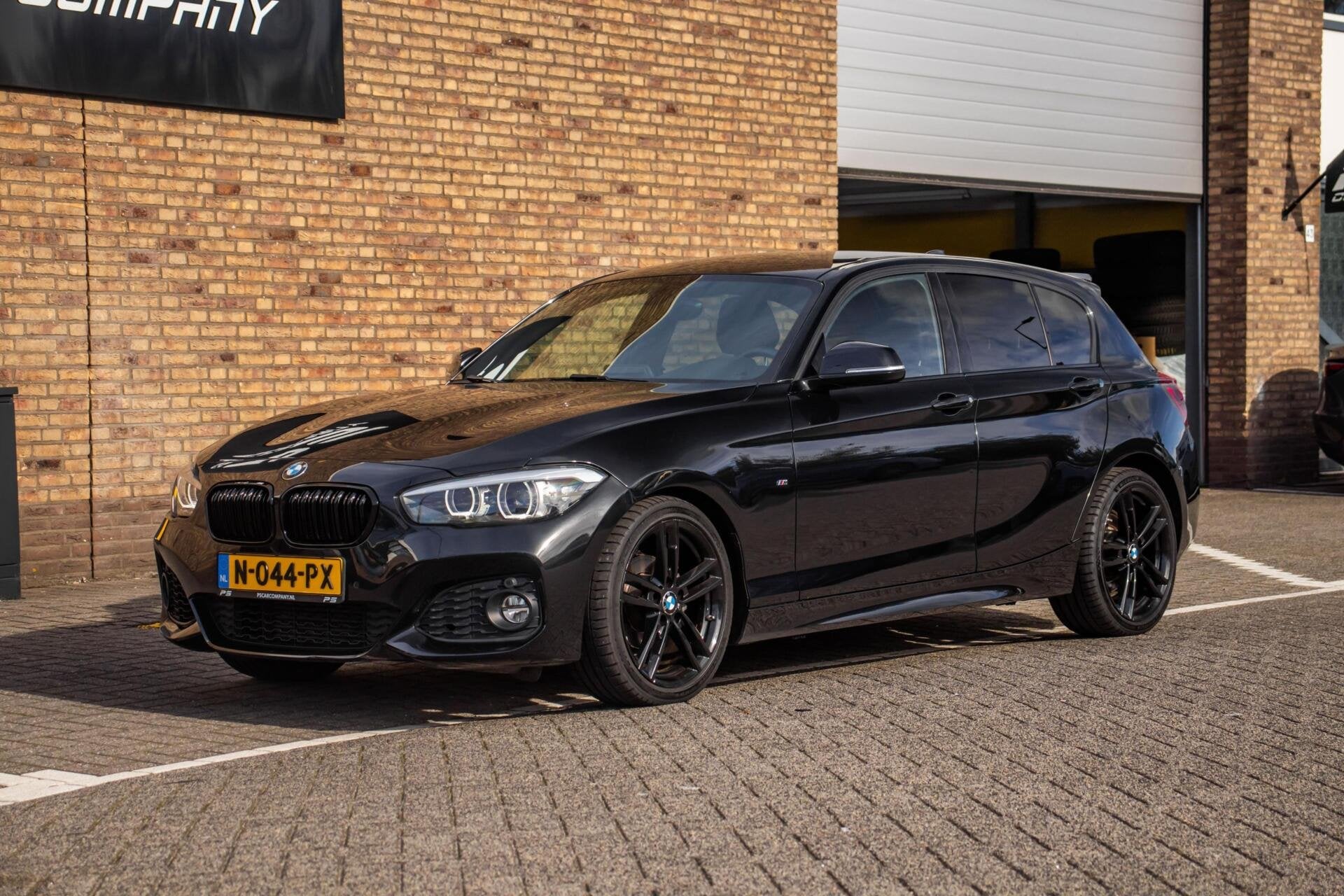 BMW 1-serie 118i M Sport Edition, Leder, Stoelverwarming, Auto's, Gebruikt, Met garantie (alle), Zwart, Leder
