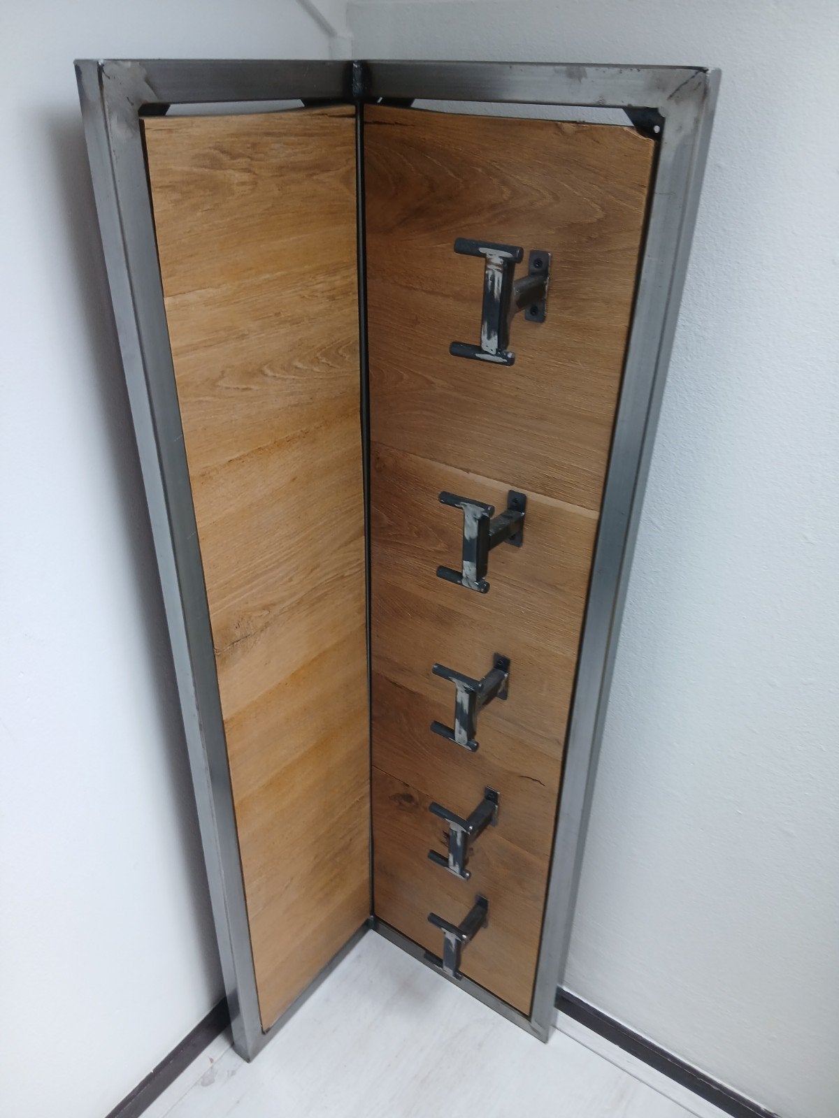 Houten/staal kapstok, Ophalen