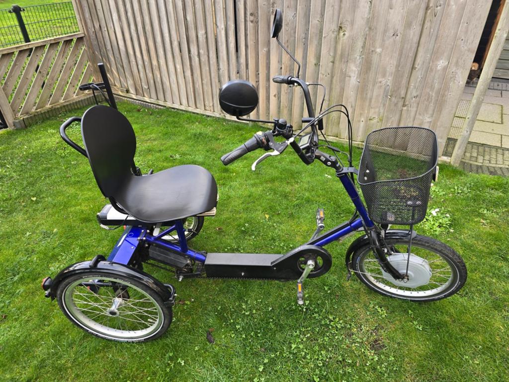 Elektrisch ondersteunde driewiel fiets., Ophalen