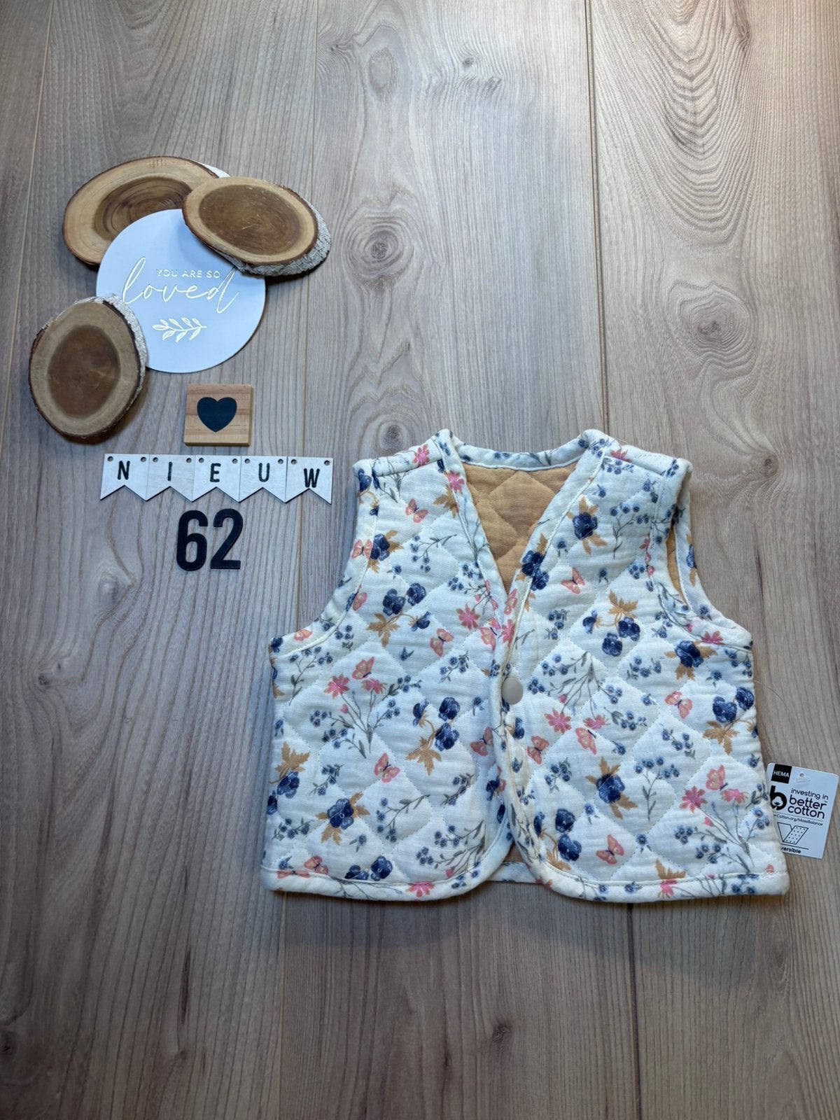 Baby meisje hema bodywarmer - gilet creme bloemen maat 62, Ophalen of Verzenden, Nieuw, Meisje, Truitje of Vestje
