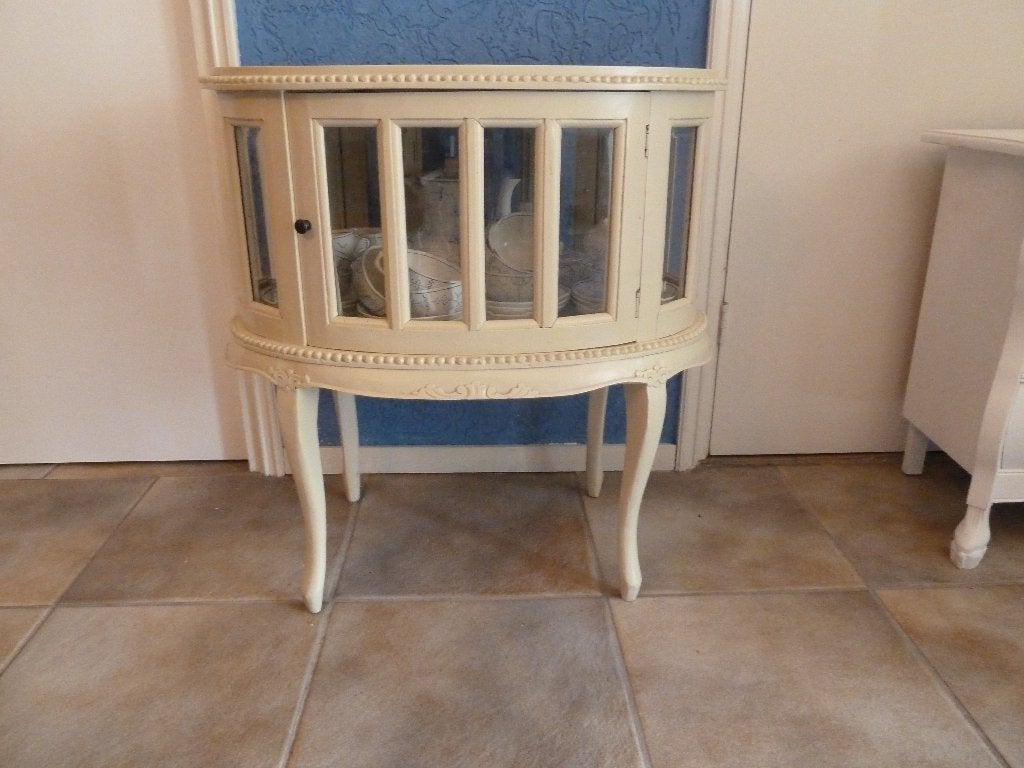 brocante ovale theekastje, Ophalen