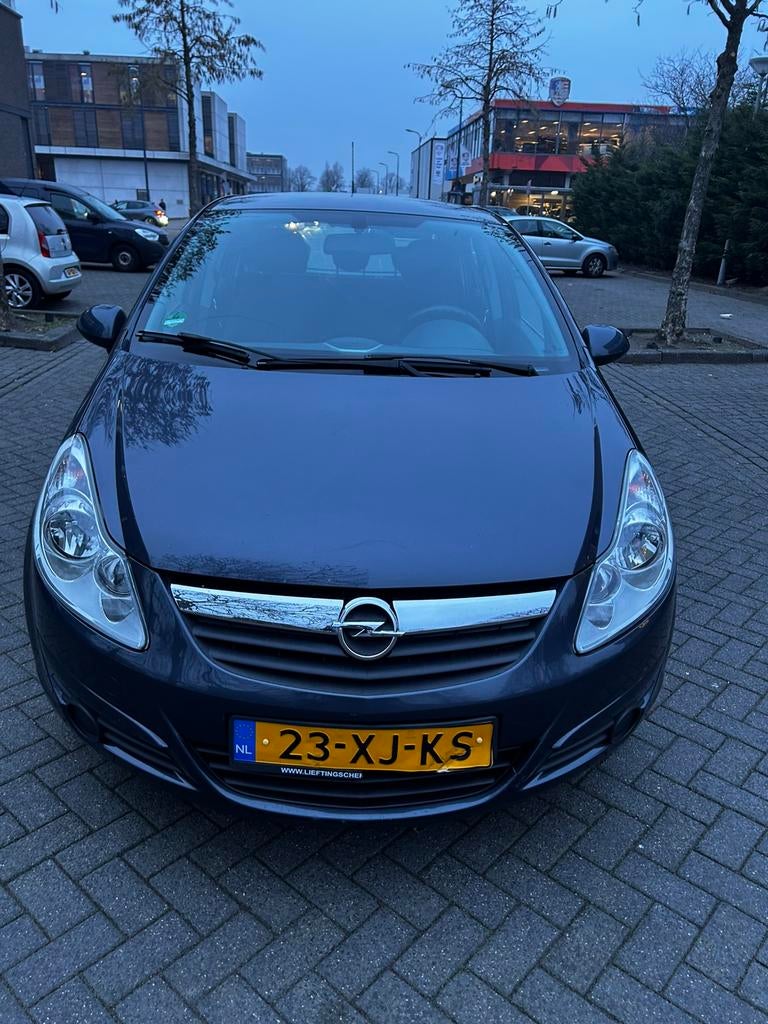 Opel Corsa 1.4 16V 5D 2007 blauw, Auto's, Opel, Voorwielaandrijving, 1063 kg, Zwart, 4 cilinders