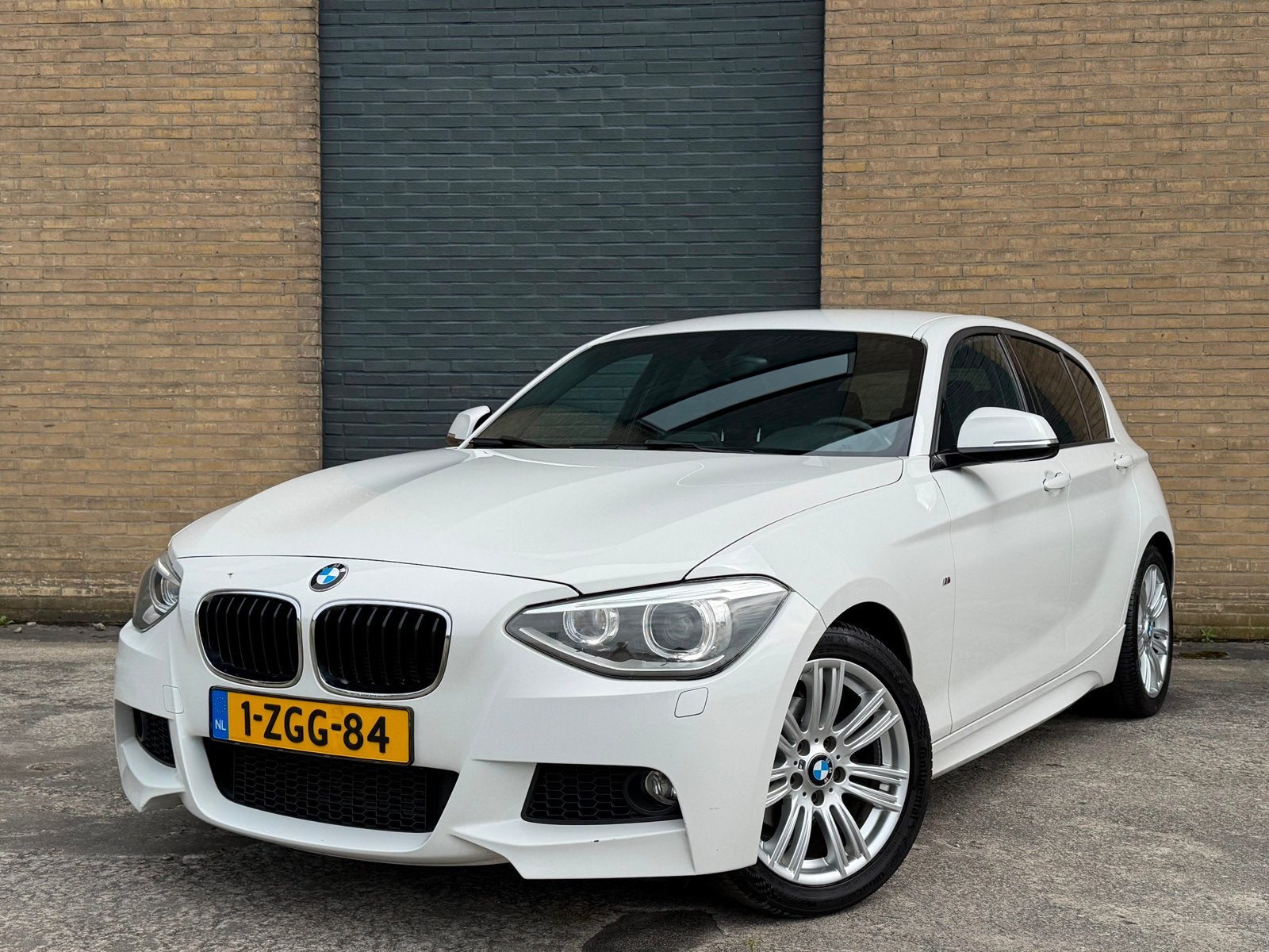 BMW 1-Serie 116i 136PK 5D 2015 Wit, Auto's, 1-Serie, 4 cilinders, Wit, Origineel Nederlands