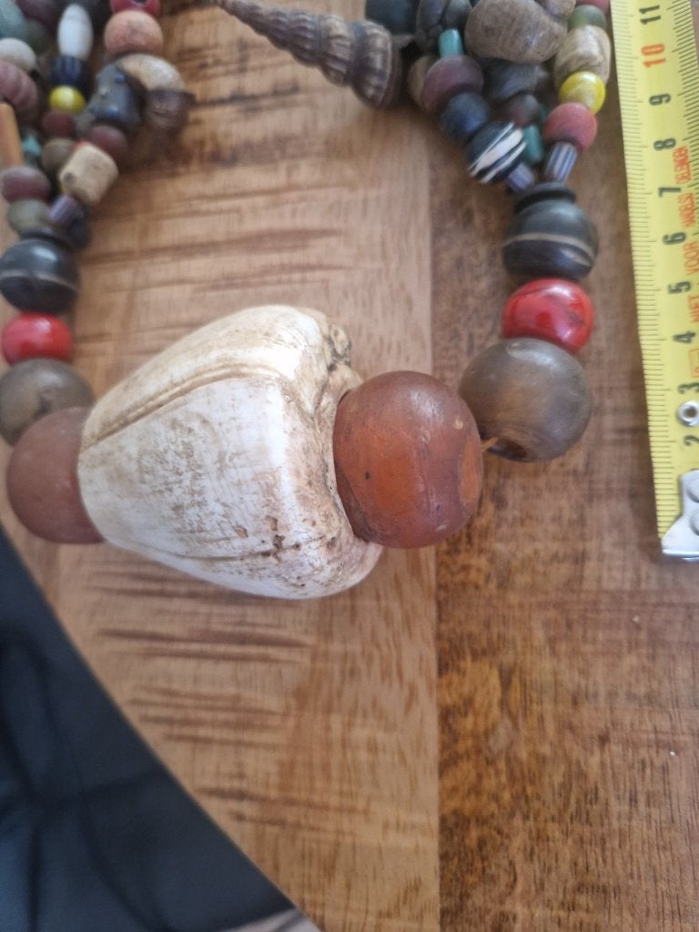Tibetaanse ketting met schelp en barnsteen, Ophalen of Verzenden