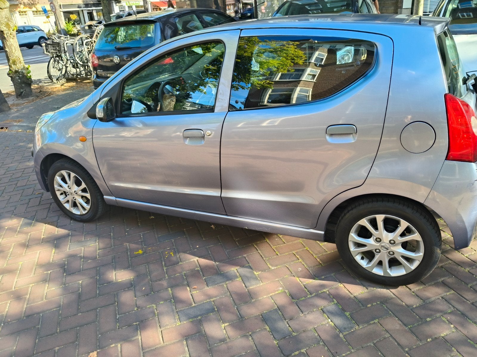 Nissan Pixo 1.0 50KW 5D 2010 grijs apk 6-2027-, Ophalen of Verzenden