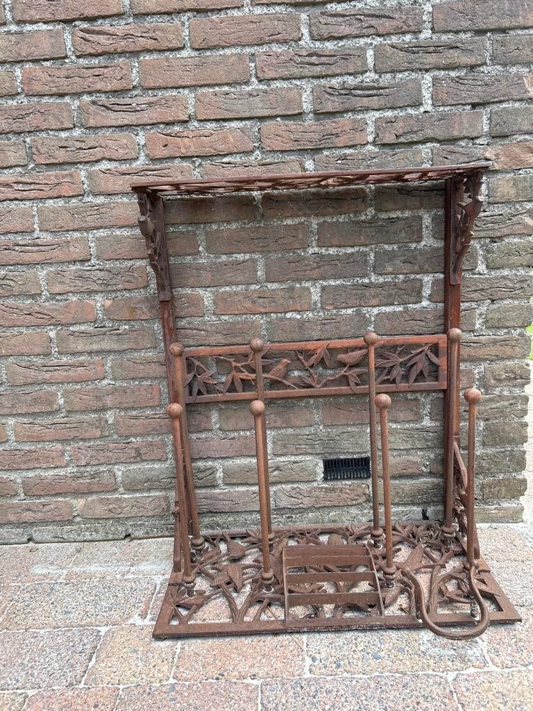 Antieke gietijzeren laarzenrek met vogelmotief, Ophalen