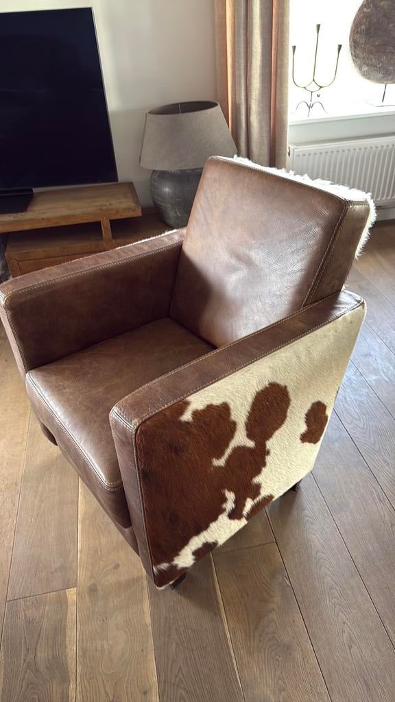 Lederen Fauteuil met koeienhuid., Ophalen, Zo goed als nieuw, Minder dan 75 cm, 50 tot 75 cm