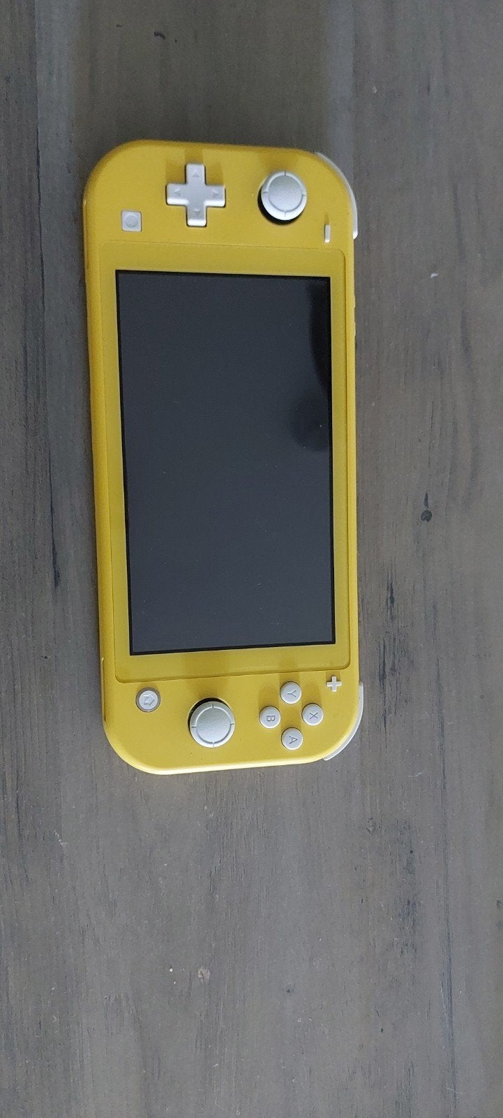 Nintendo Switch Lite Geel met 5 games en hoesje, Gebruikt, Ophalen of Verzenden, Zonder controller, Switch Original