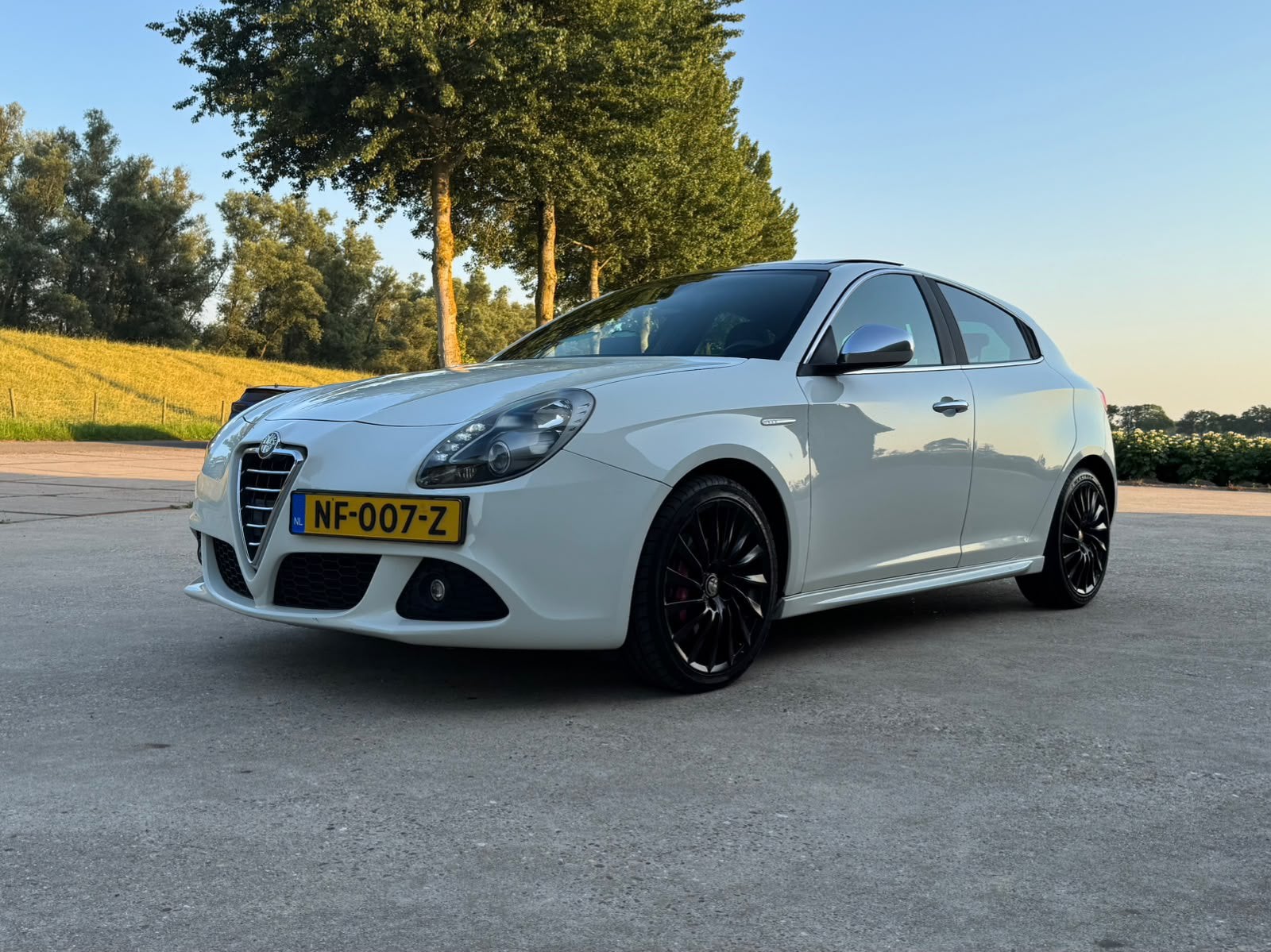 Alfa Romeo Giulietta 1.4 Turbo Multi AIR 2012 Wit, Auto's, Alfa Romeo, Voorwielaandrijving, Zwart, 4 cilinders, Wit