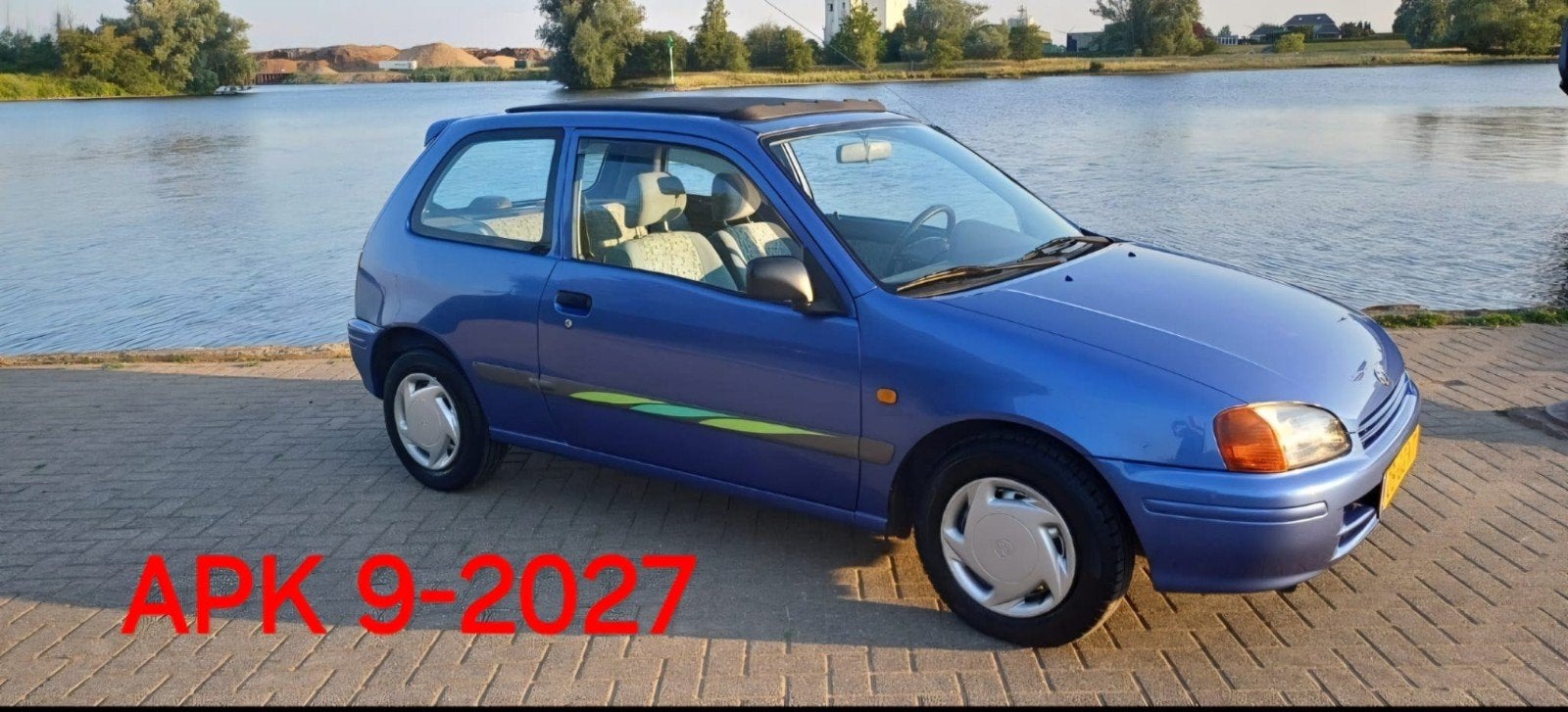 Toyota Starlet 1.3 16V AUT 1997 Blauw NIeuwe APK 09-2027, Auto's, Stof, Starlet, Grijs, Particulier