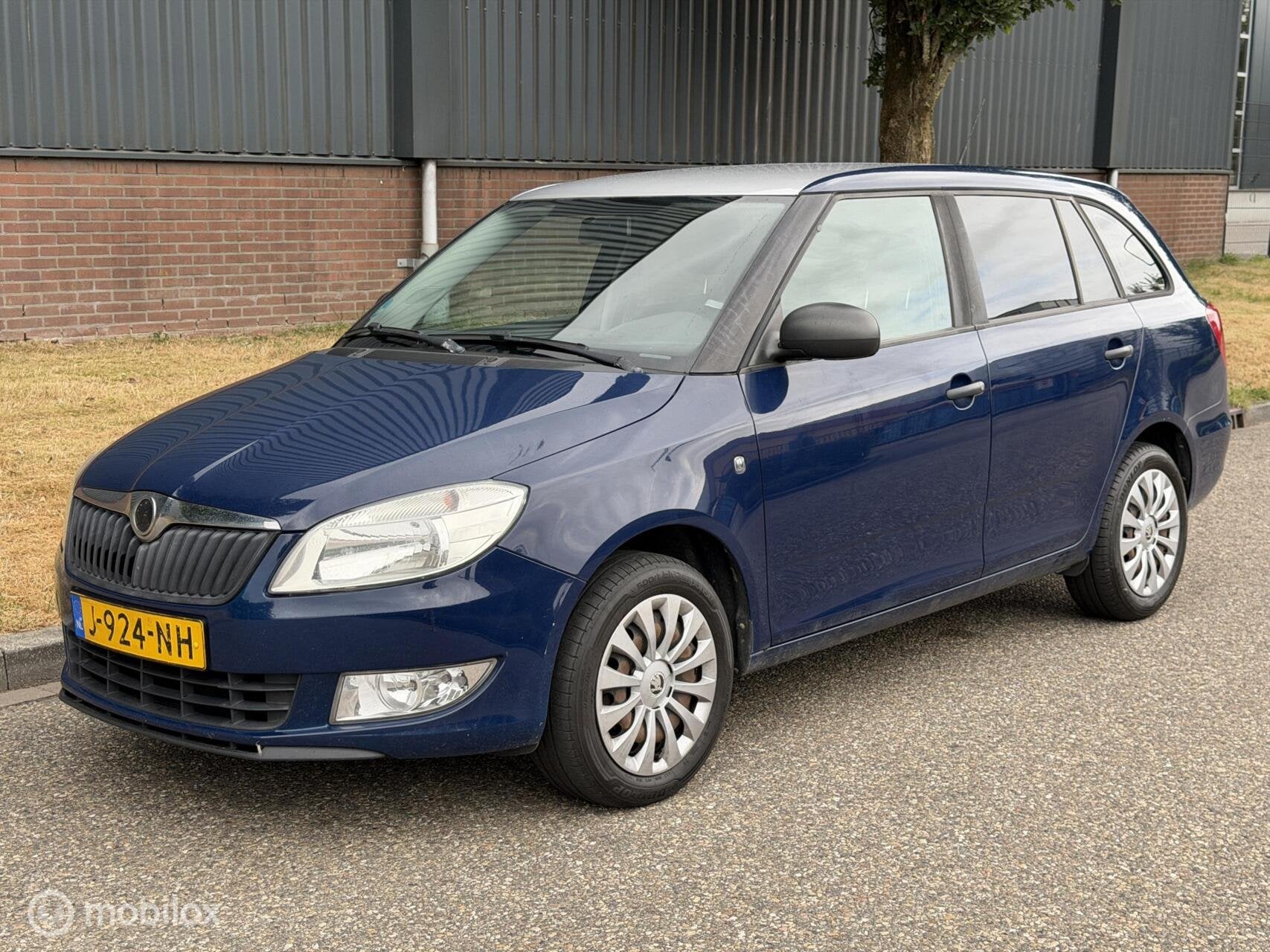 Skoda Fabia Combi 1.2 Airco Trekhaak Goed Onderhoud, Auto's, Skoda, Euro 5, Stof, Zwart, Blauw