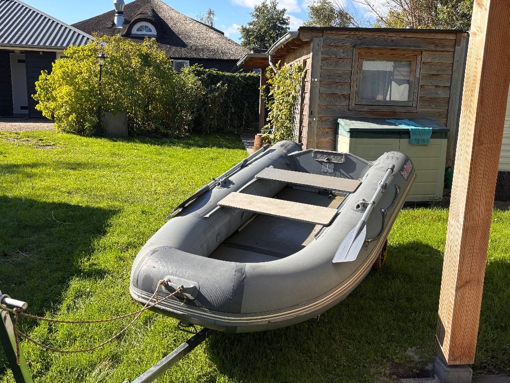 Rubberboot met 6pk motor, Watersport en Boten, Ophalen, Gebruikt, Inclusief trailer, 6 pk