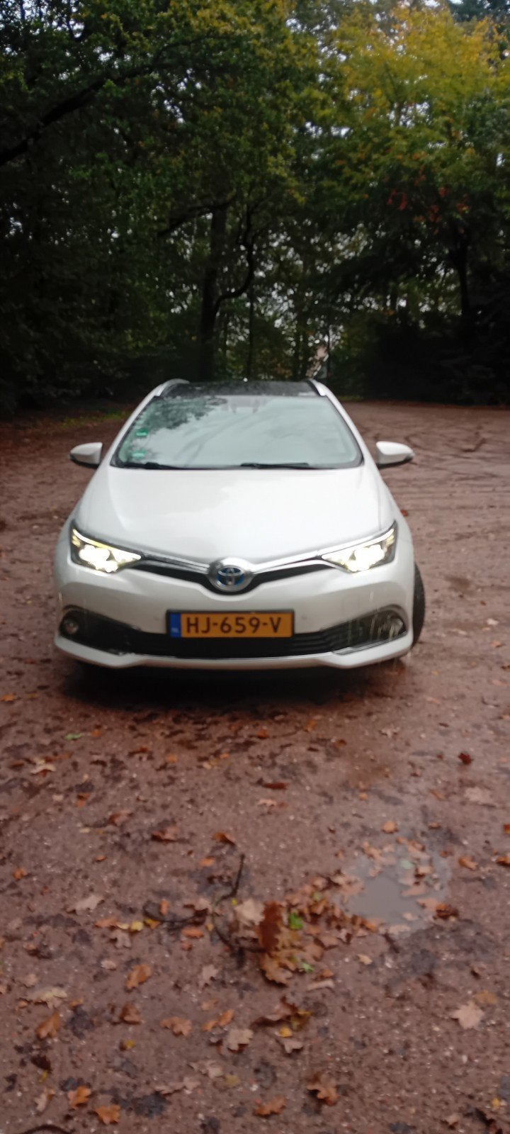 Toyota Auris 1.8 Hybrid Touring Sports CVT 2015 Wit, Auto's, 28 km/l, 345 kg, Wit, Origineel Nederlands